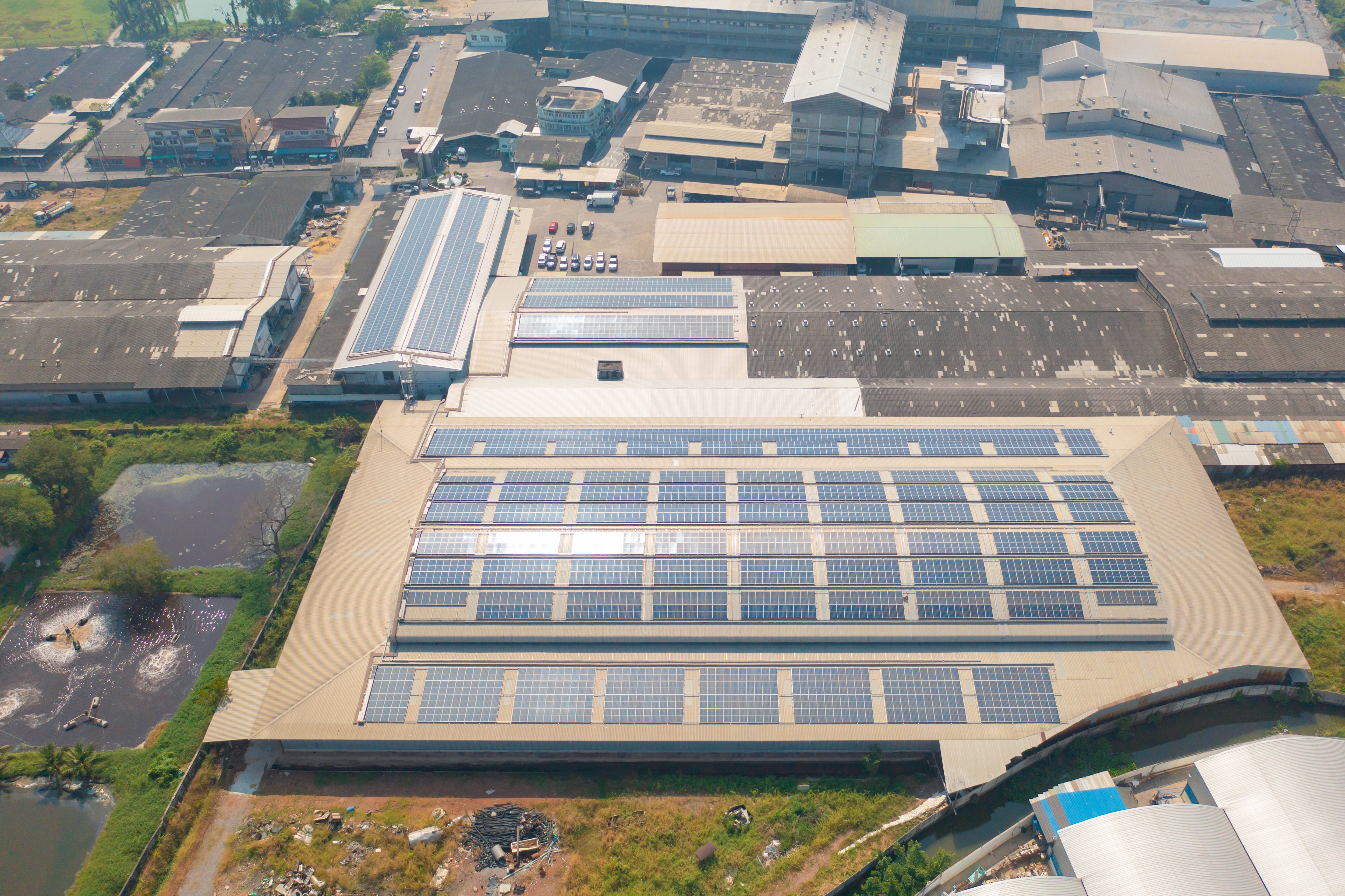 solar-panels-on-factory-roof-aerial-view-2026-03-10-02-06-45-utc